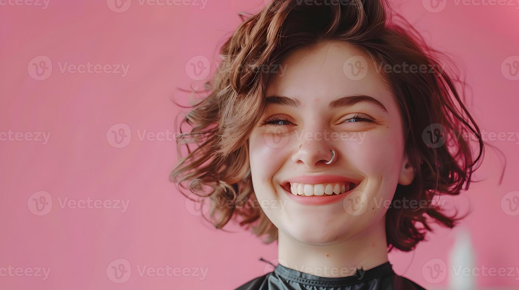 Young Hair Stylist Expertly Working on a Vibrant Color Background Demonstrating Joy and Success in the Salon Industry photo