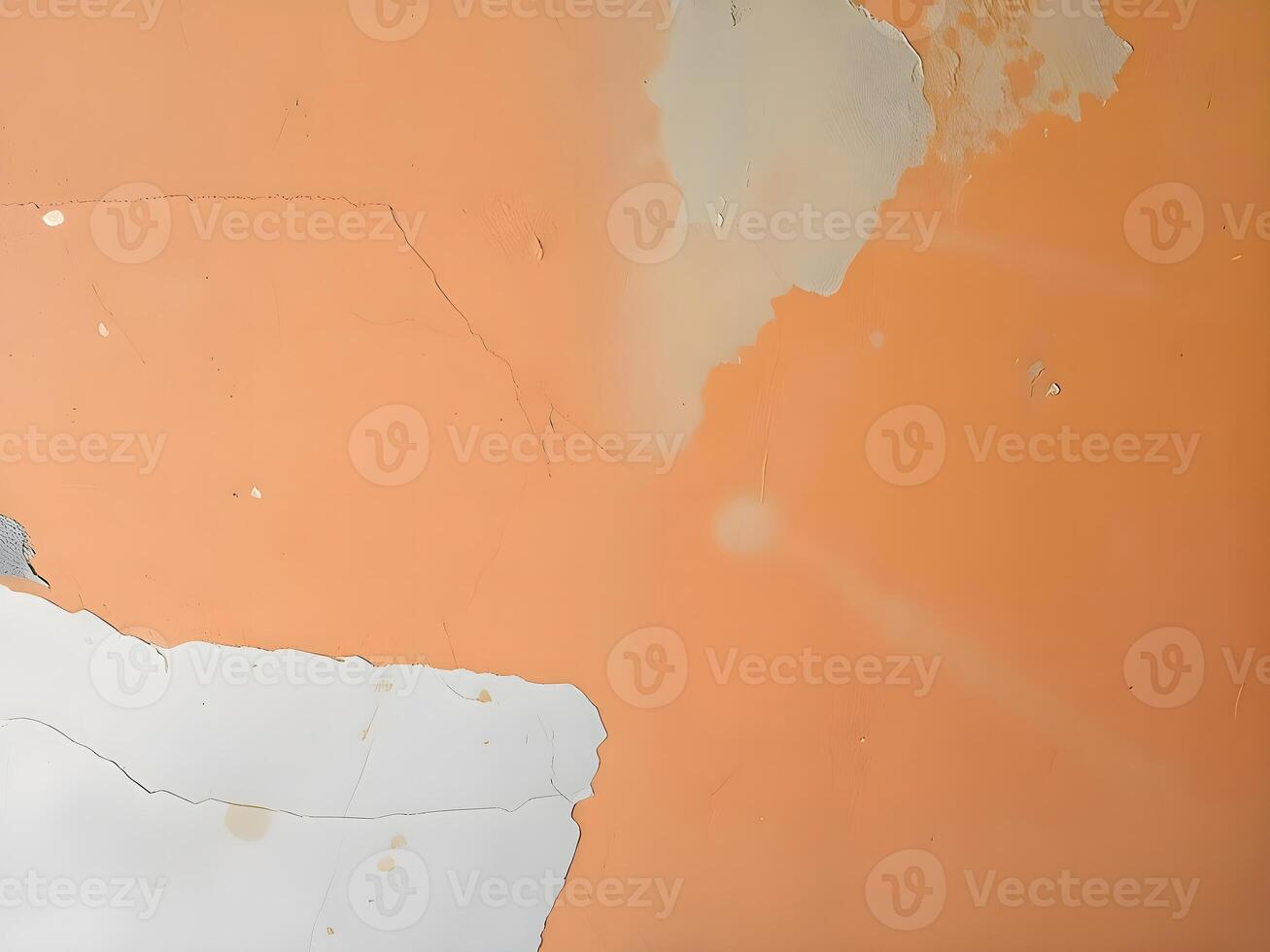 A peeling orange wall with a white paint splotch photo