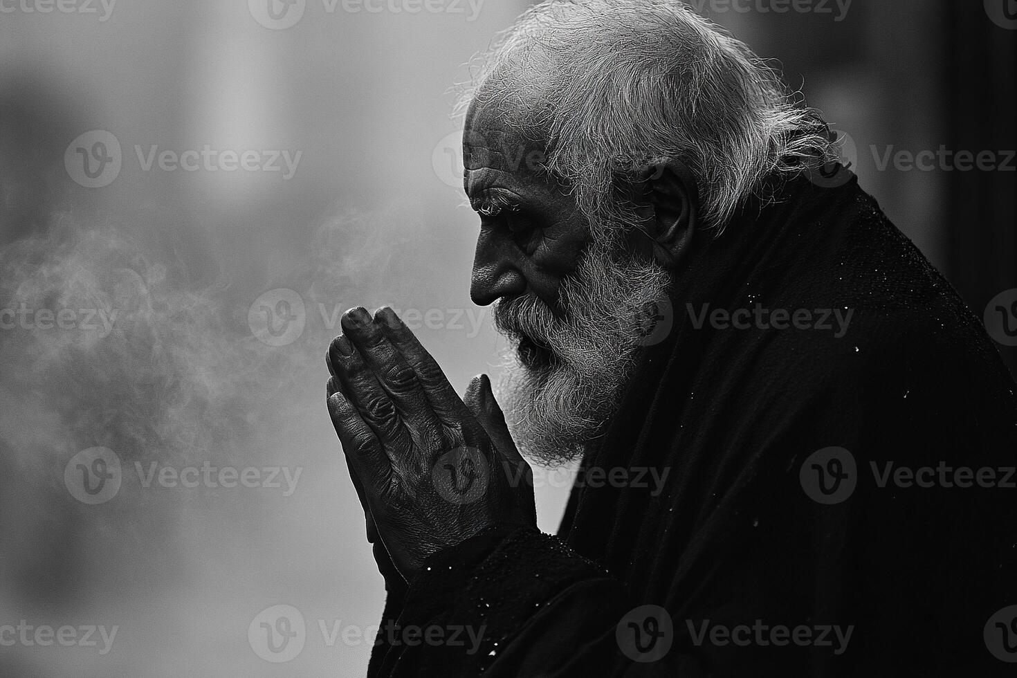 An elderly man with a beard folded his hands in prayer to the Lord God. A black and white image of an old man begging for forgiveness. Generated by artificial intelligence photo
