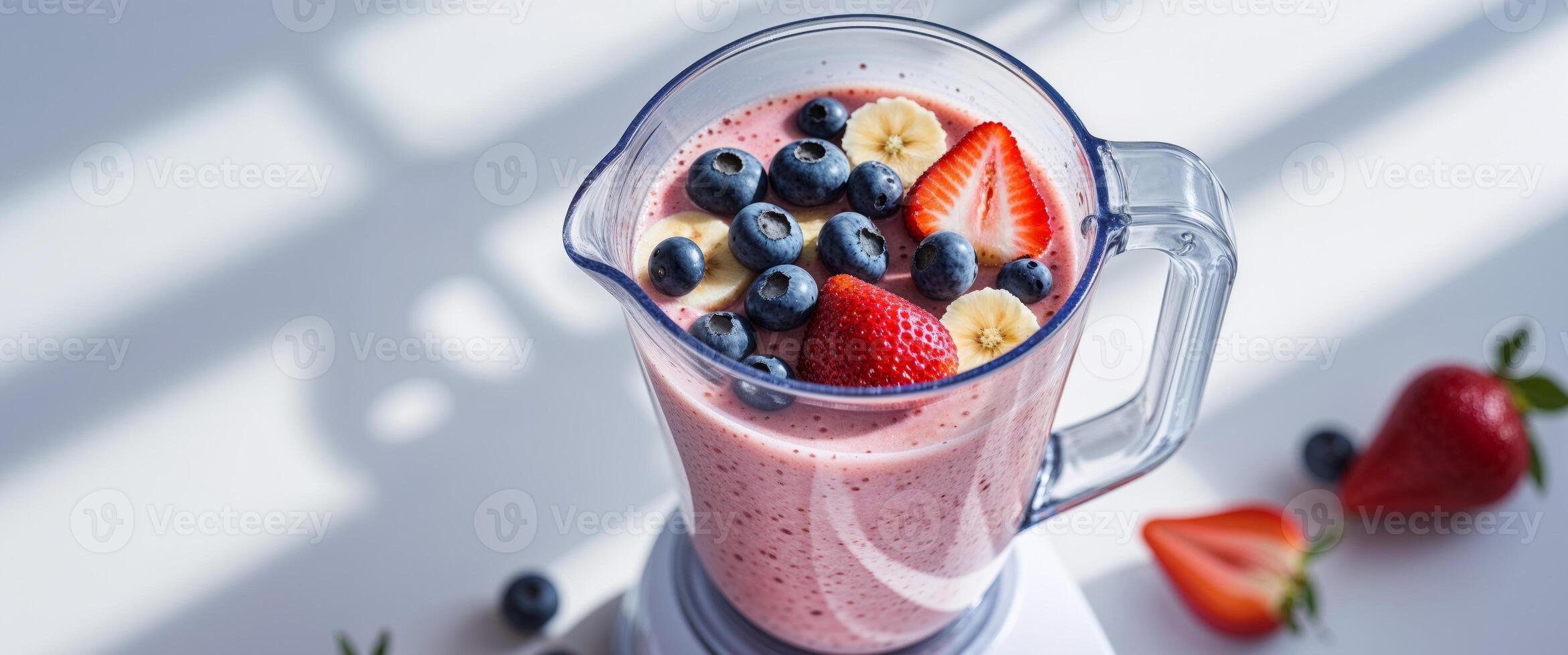 Fresh Fruit Smoothie in Blender Ready to Blend. photo