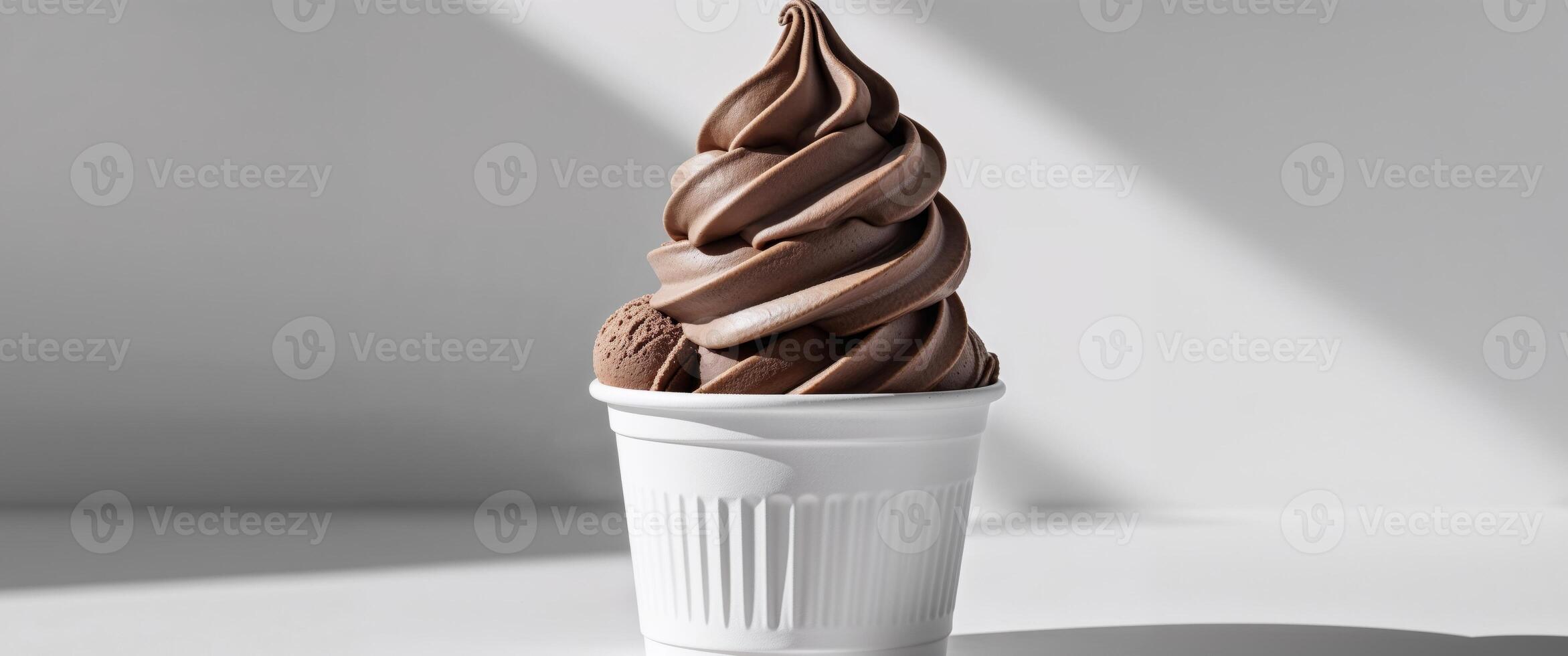 Delicious Chocolate Soft Serve Ice Cream in a Disposable Cup. photo
