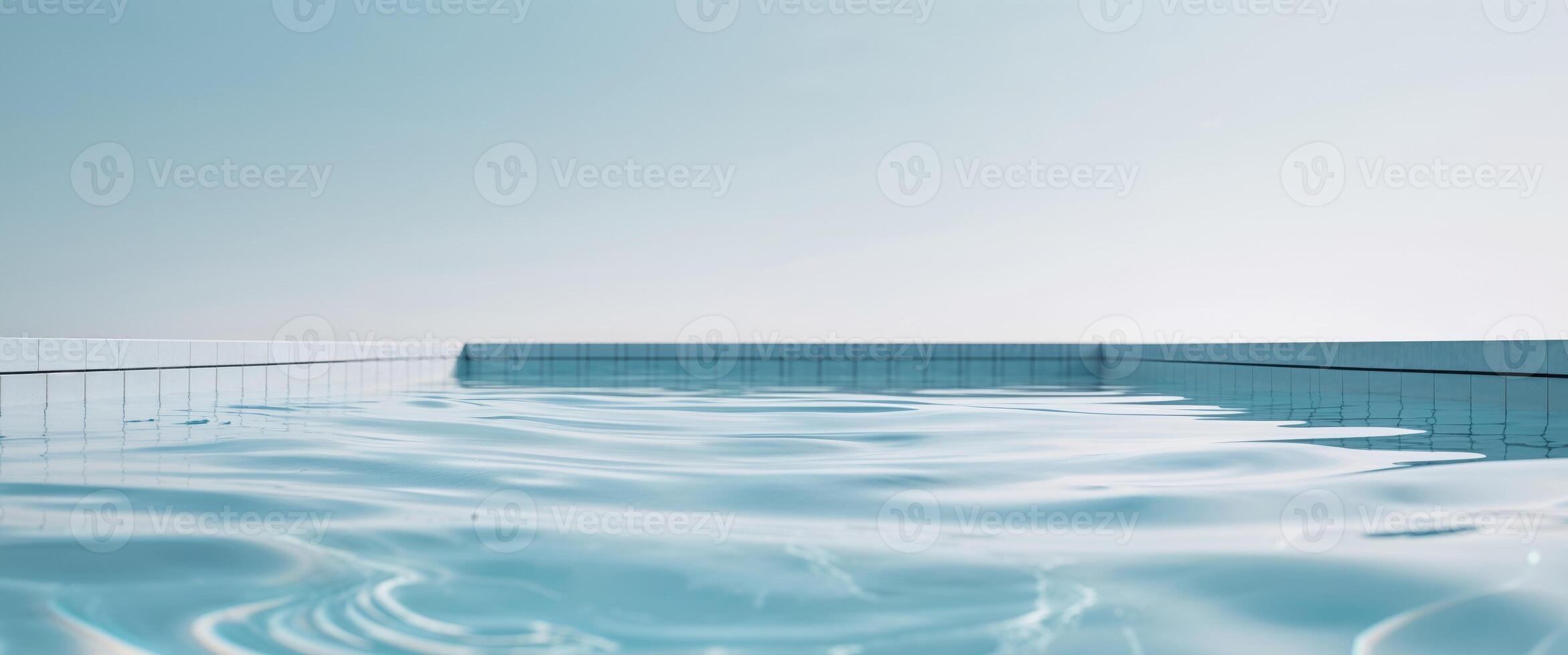 Clear blue swimming pool water with ripples and reflections creating a tranquil aquatic scene Copy Space. photo