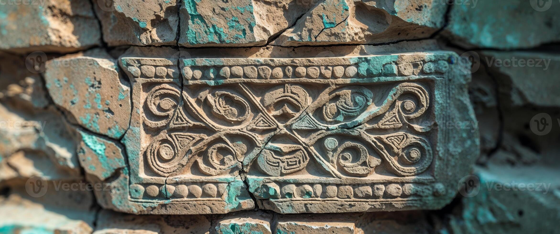 Ancient carvings on the wall of a building photo