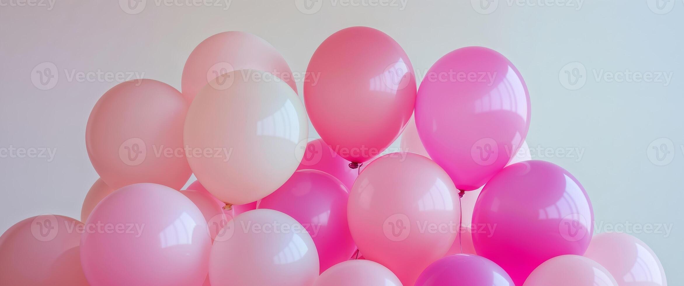 Colorful Party Balloons in Various Shades of Pink and Soft Background for Celebrations photo