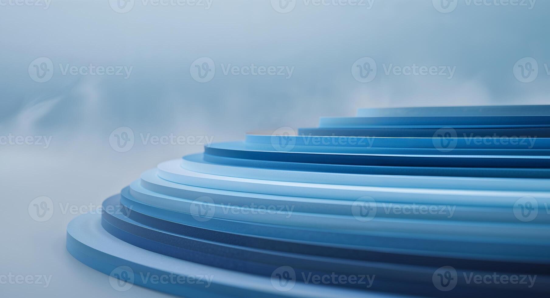 Blue spiral staircase with clouds and fog photo
