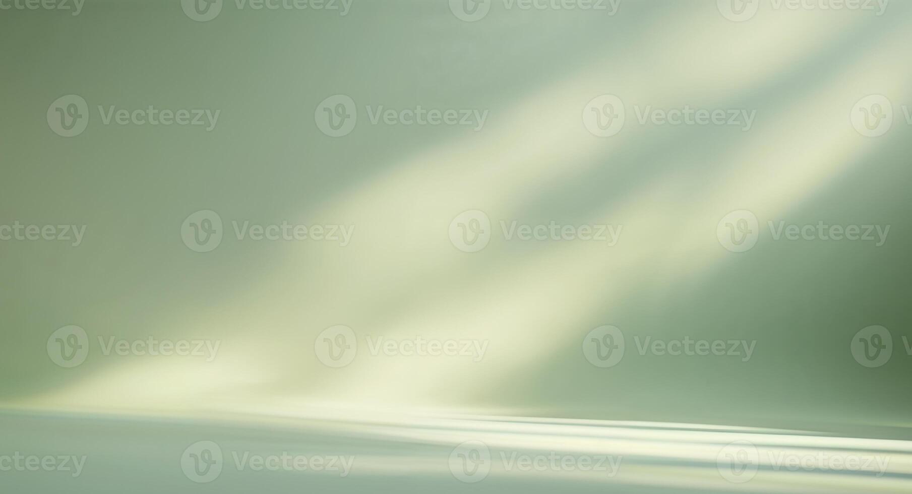 An empty room with a white wall and a light photo
