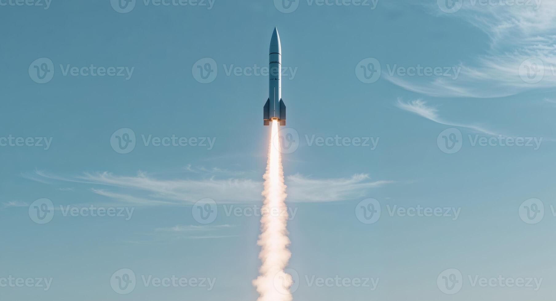 A rocket is taking off into the sky photo