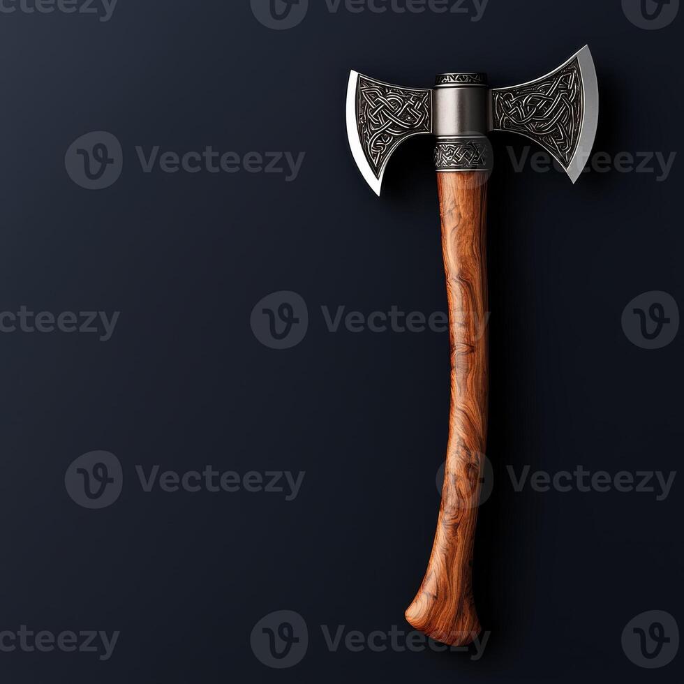 A double bladed axe with intricate designs on a dark background photo