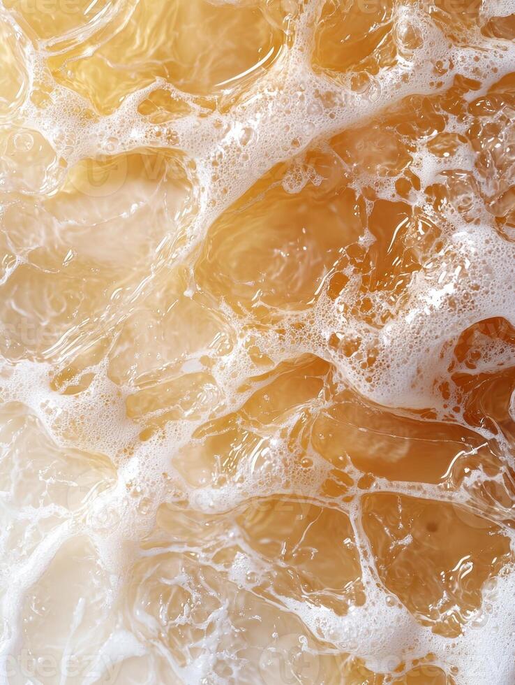 Refreshing iced tea with bubbles and ice photo