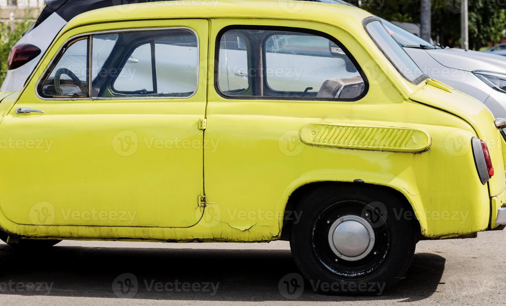 Old fashioned car in city photo