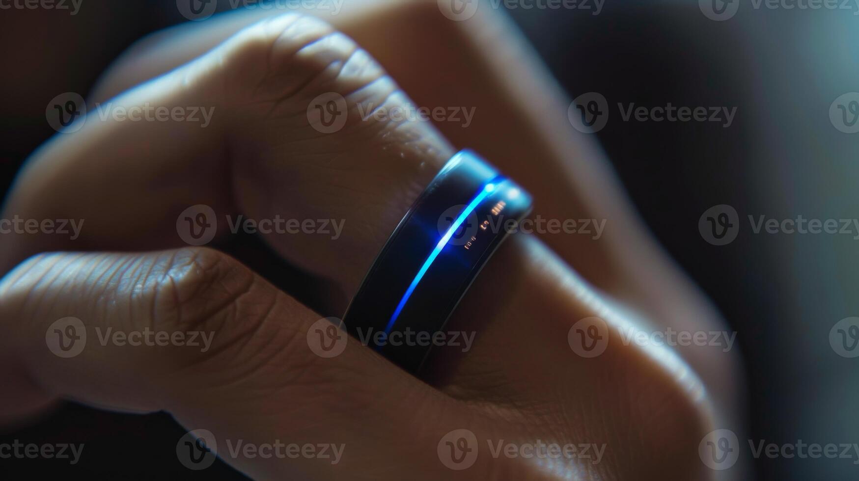 A person is using a sleek wearable device on their wrist aimed at monitoring mental health and mindfulness. The technology blooms in the field of telemedicine, promoting mental wellness. photo