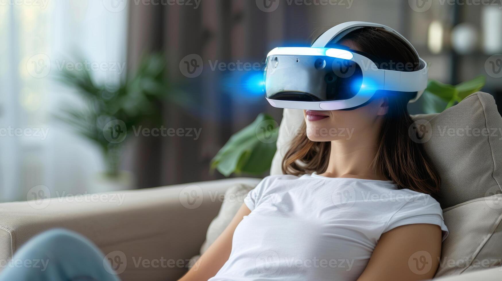 A person is seated comfortably on a couch, wearing a virtual reality headset, engaged in digital therapy focused on mindfulness and mental health. The ambient setting is calming and well lit. photo