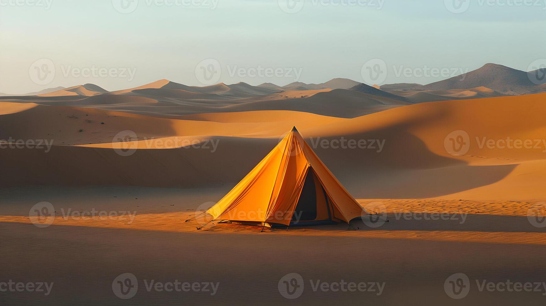 Serene solitude a tent stands amidst the undulating dunes of the sahara desert photo