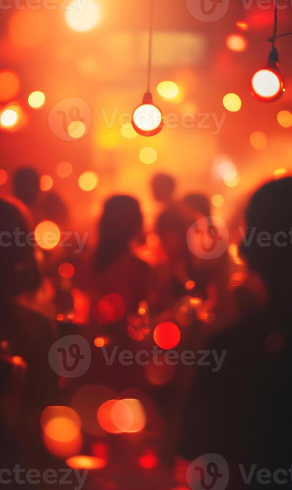 Vibrant nightlife atmosphere with blurred people and glowing lights creating a warm scene photo