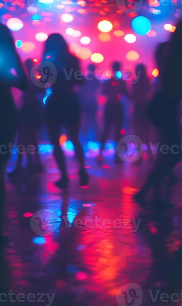 Energetic night out with friends at the club with a dynamic dance floor atmosphere photo