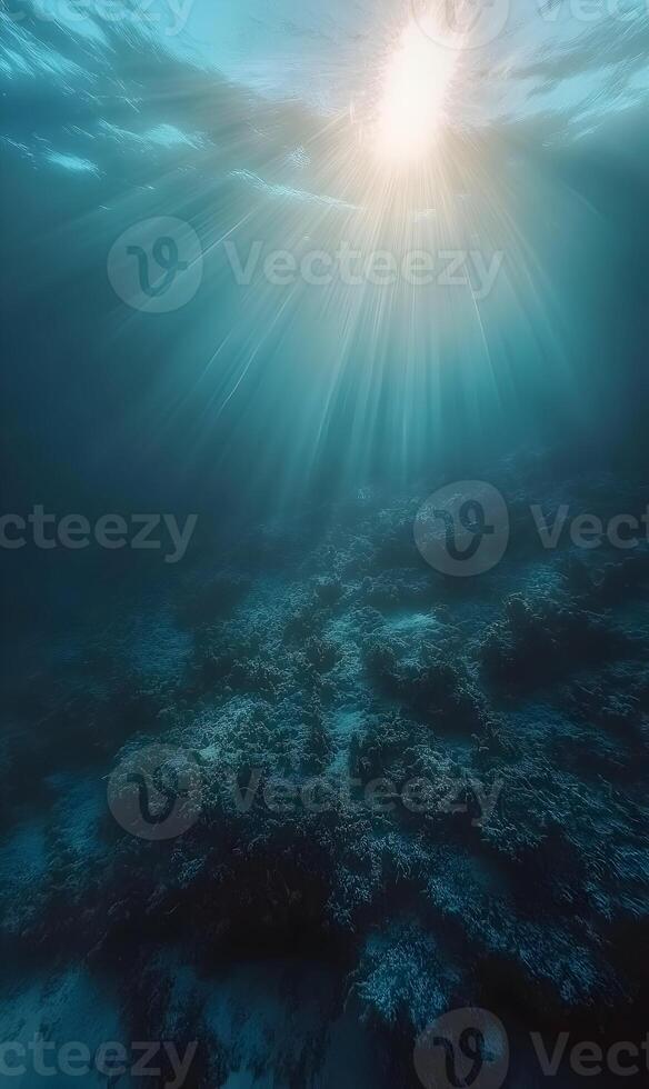 Underwater realm with sunbeams illuminating the seabed, evoking serene deep ocean photo