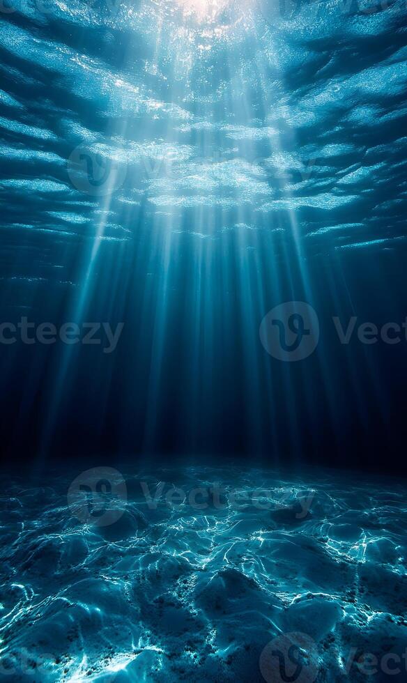 Underwater Sunlight Illuminating the Ocean Floor, Creating a Serene and Dreamlike Atmosphere photo