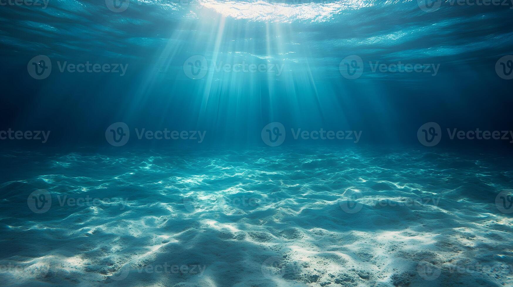 Underwater Sunlight Filtering Through the Ocean Surface illuminating the seabed photo
