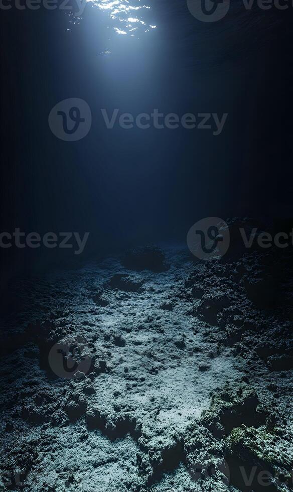 Underwater landscape featuring sunlight penetrating through the water surface calmly photo