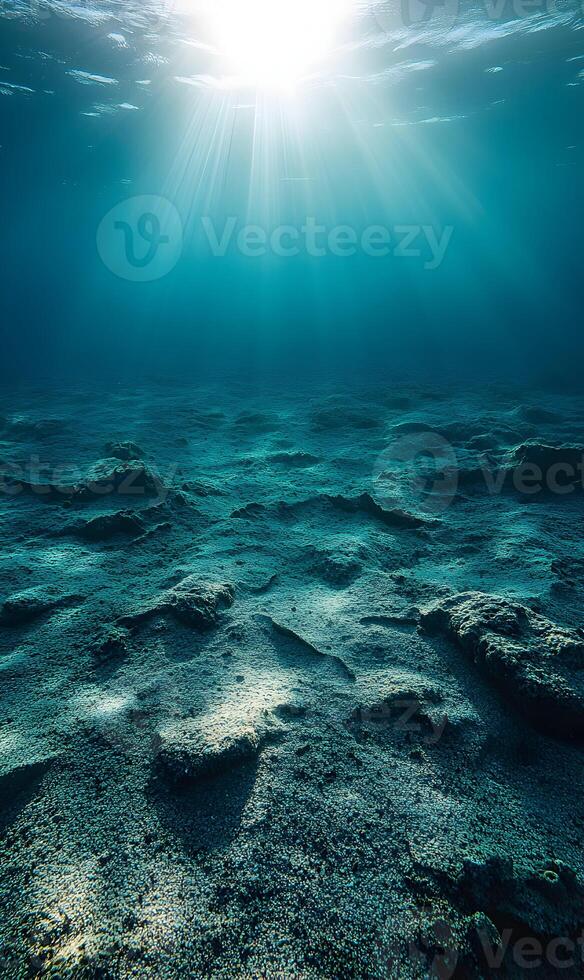 Underwater Tranquility, Sunlight Filtering Through the Azure Depths of Ocean Floor photo