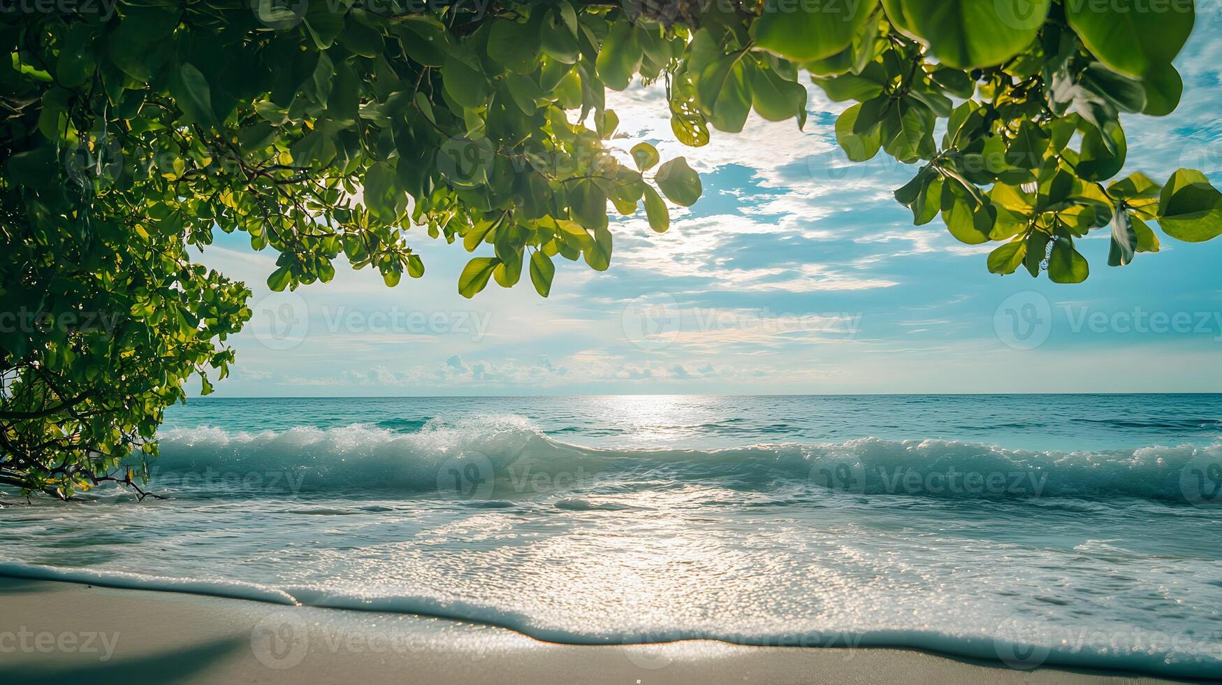 Serene tropical beach scene with lush foliage framing ocean views and gentle waves photo