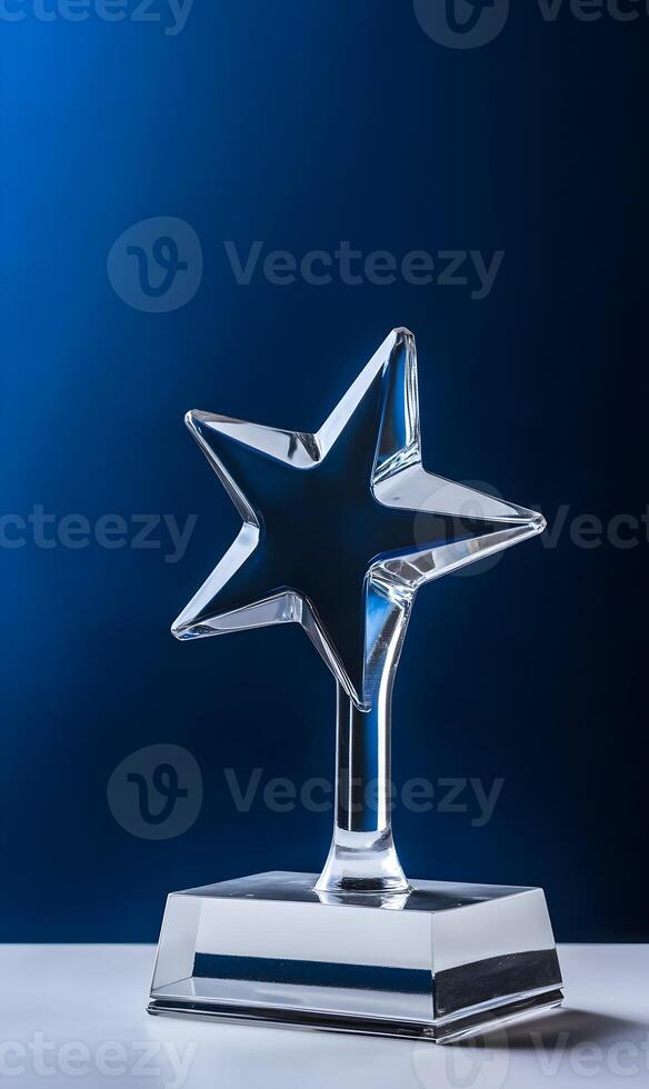 Elegant Glass Star Award Trophy Symbolizing Success and Recognition on a Blue Background photo