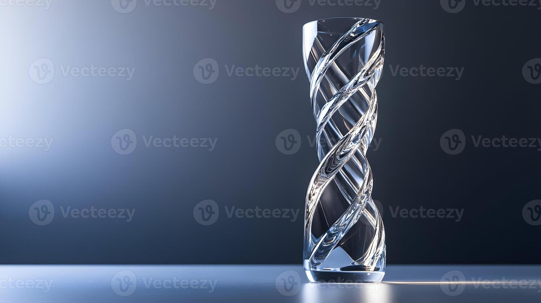 Elegant crystal vase with intricate twisted design under soft and illuminating studio light photo