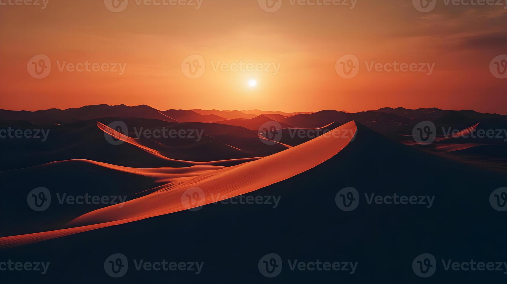 Scenic desert landscape with sun setting on the horizon casting warm light on dunes photo