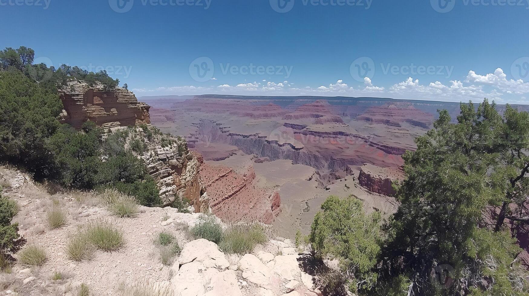 Panoramic view of the majestic Grand Canyon under a cloudy sky photo