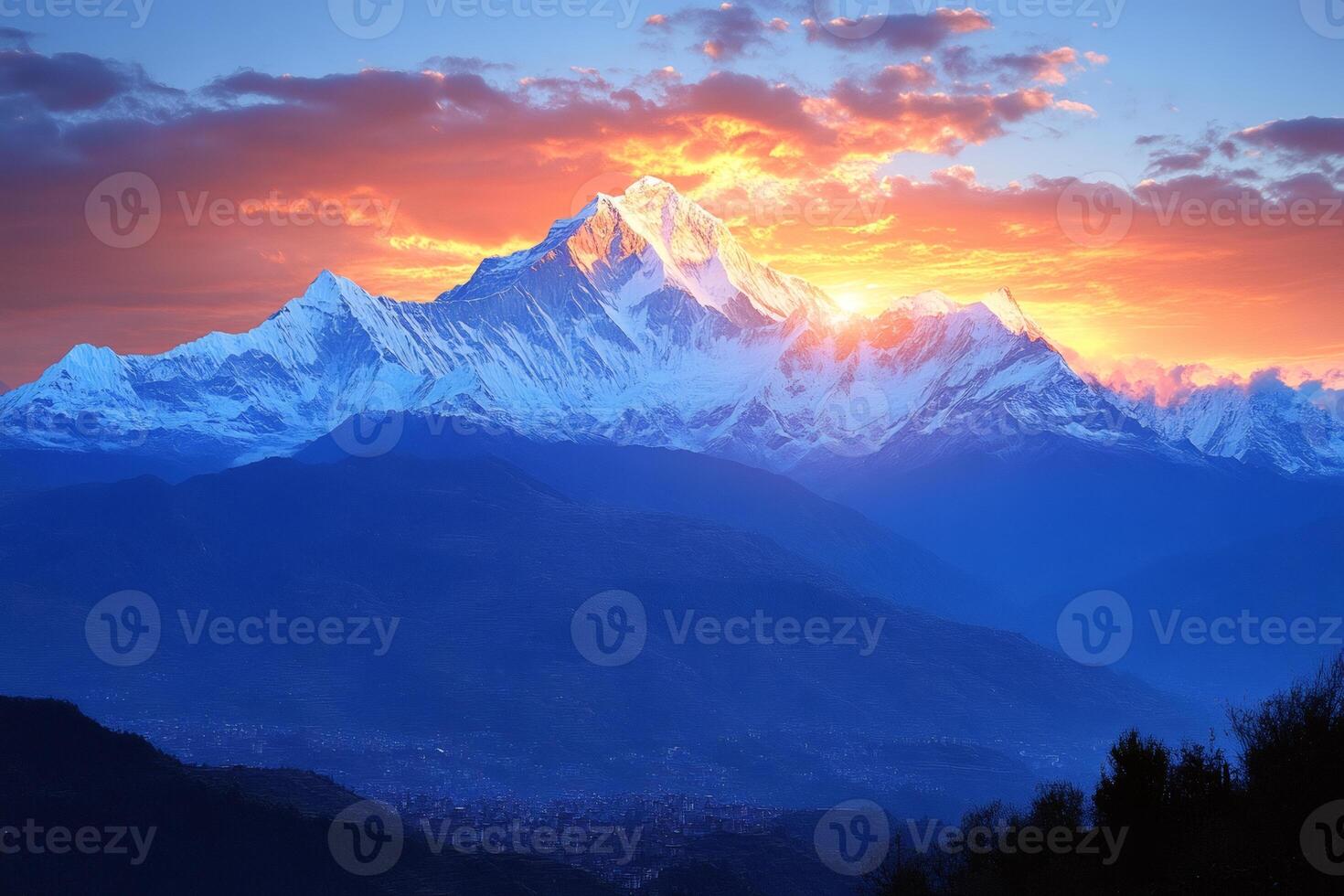 Dhaulagiri mountain glowing during colorful sunset in Nepal photo