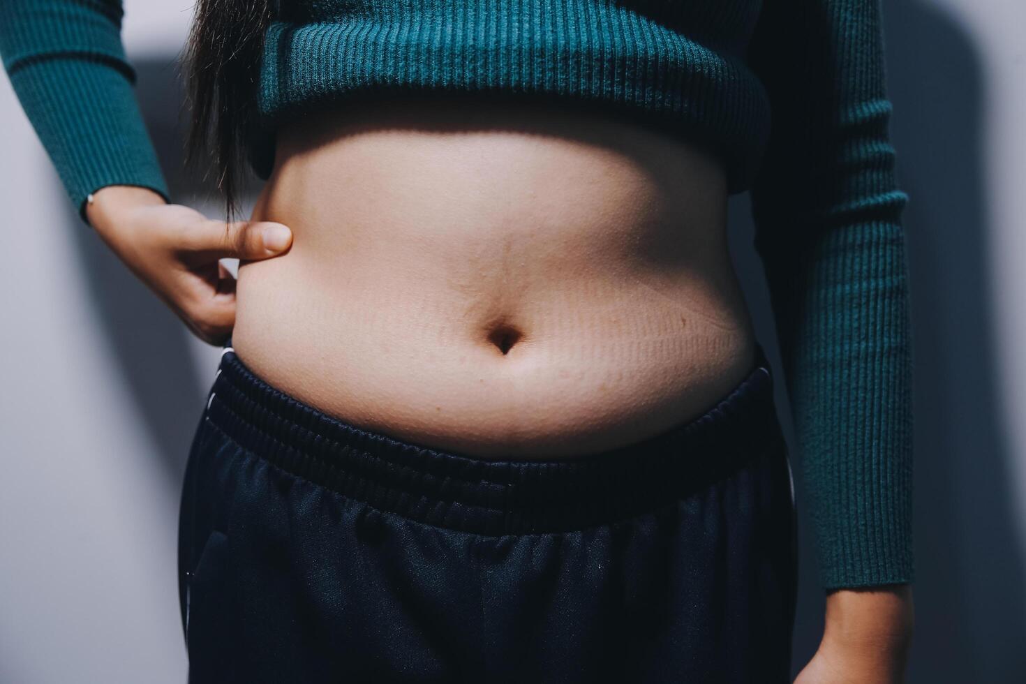 A woman with a flat stomach photo
