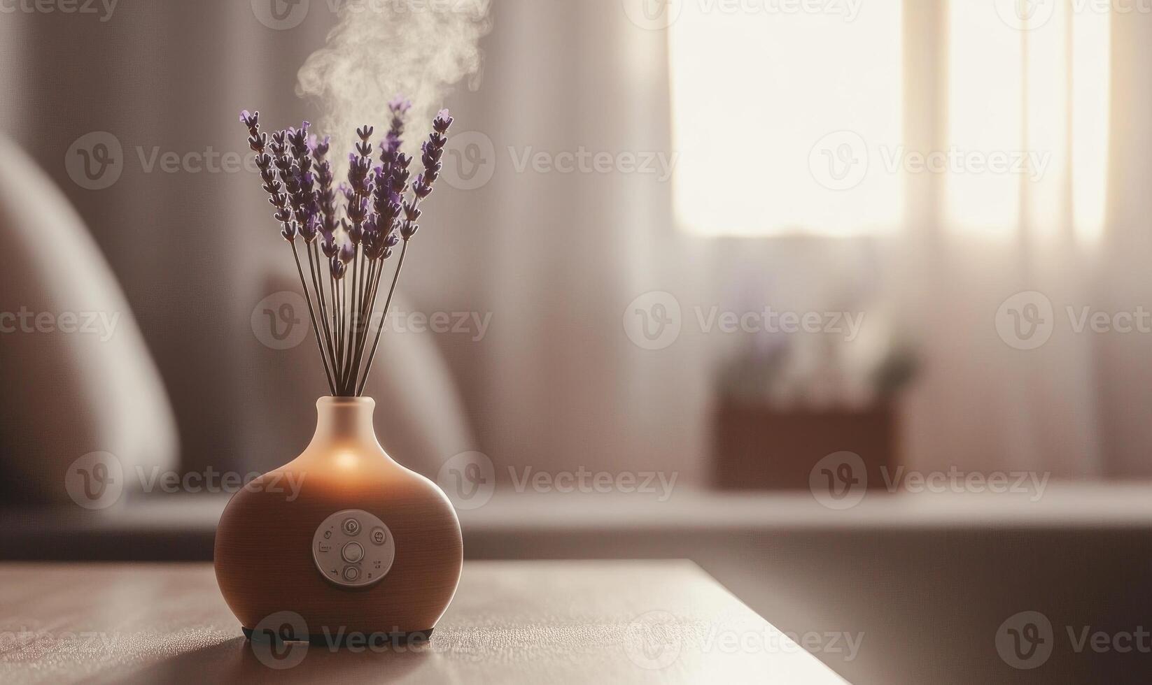 A vase with lavender flowers in it sits on a table photo