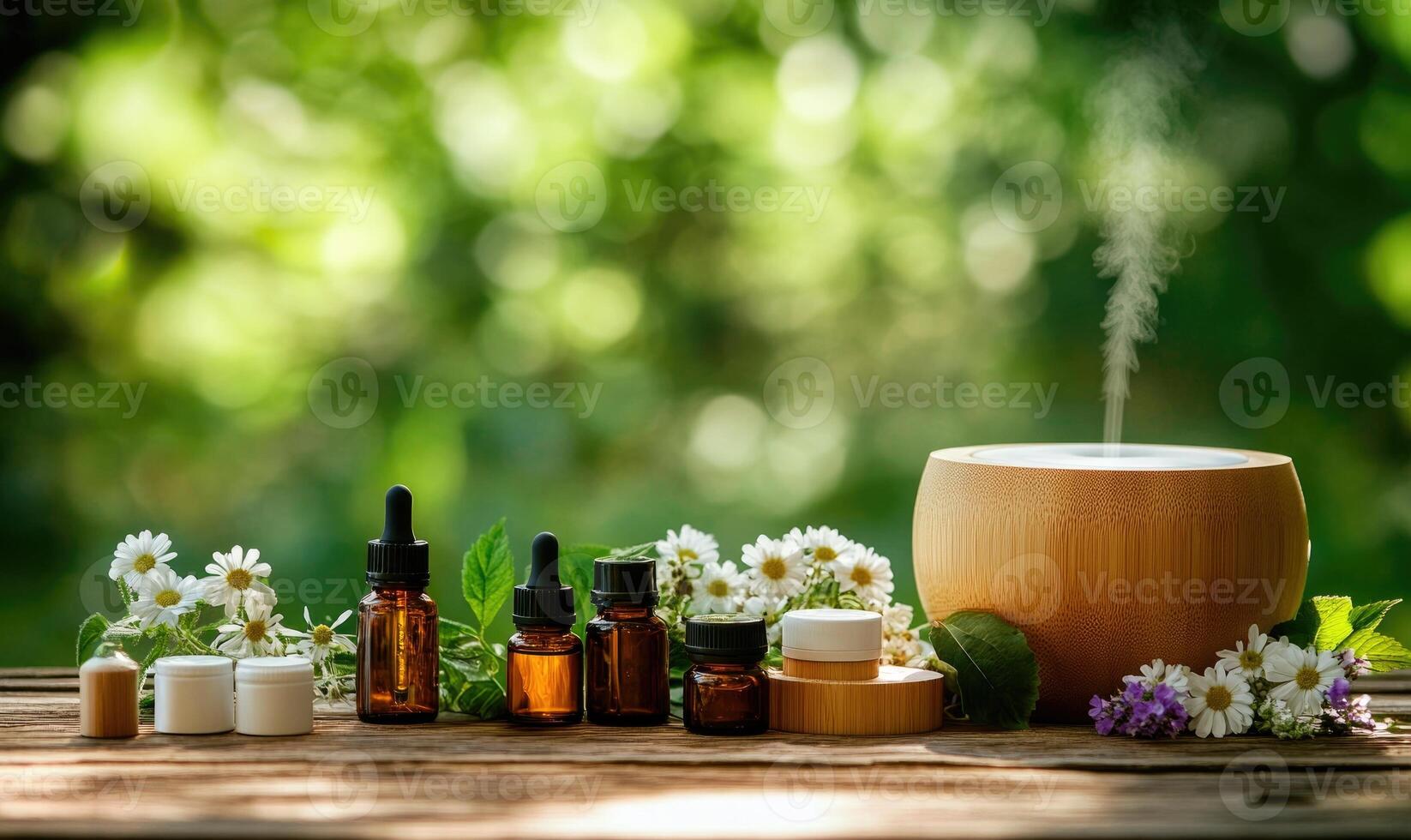 A wooden table with a diffuser, several bottles of essential oils photo