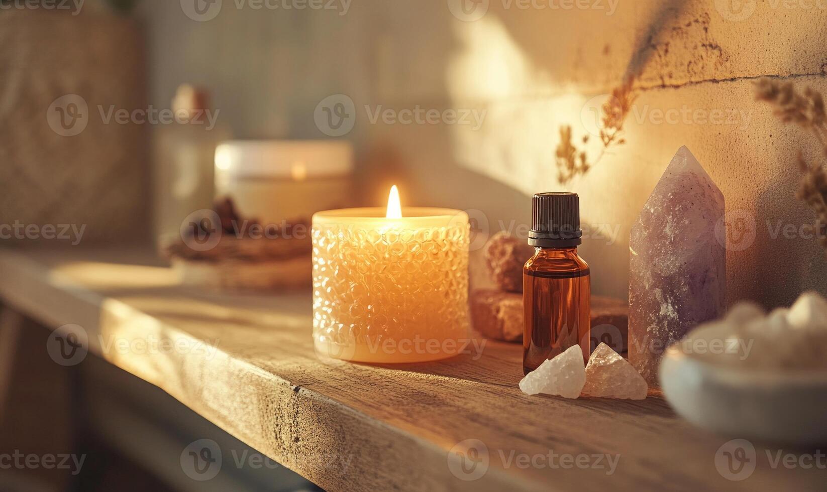candle, essential oils and crystals on a shelf photo