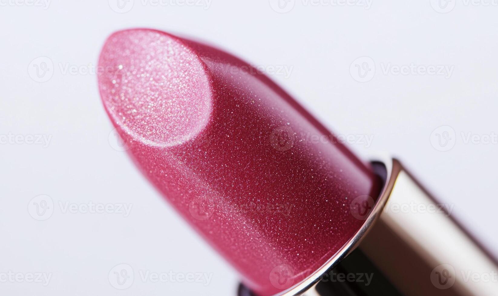 a close up of a lipstick with a pink color photo