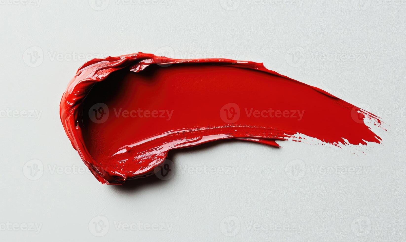 A red lipstick stain on a white surface photo