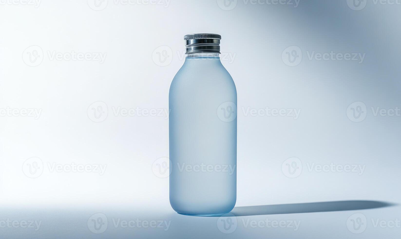 a blue bottle with a white lid sitting on a table photo
