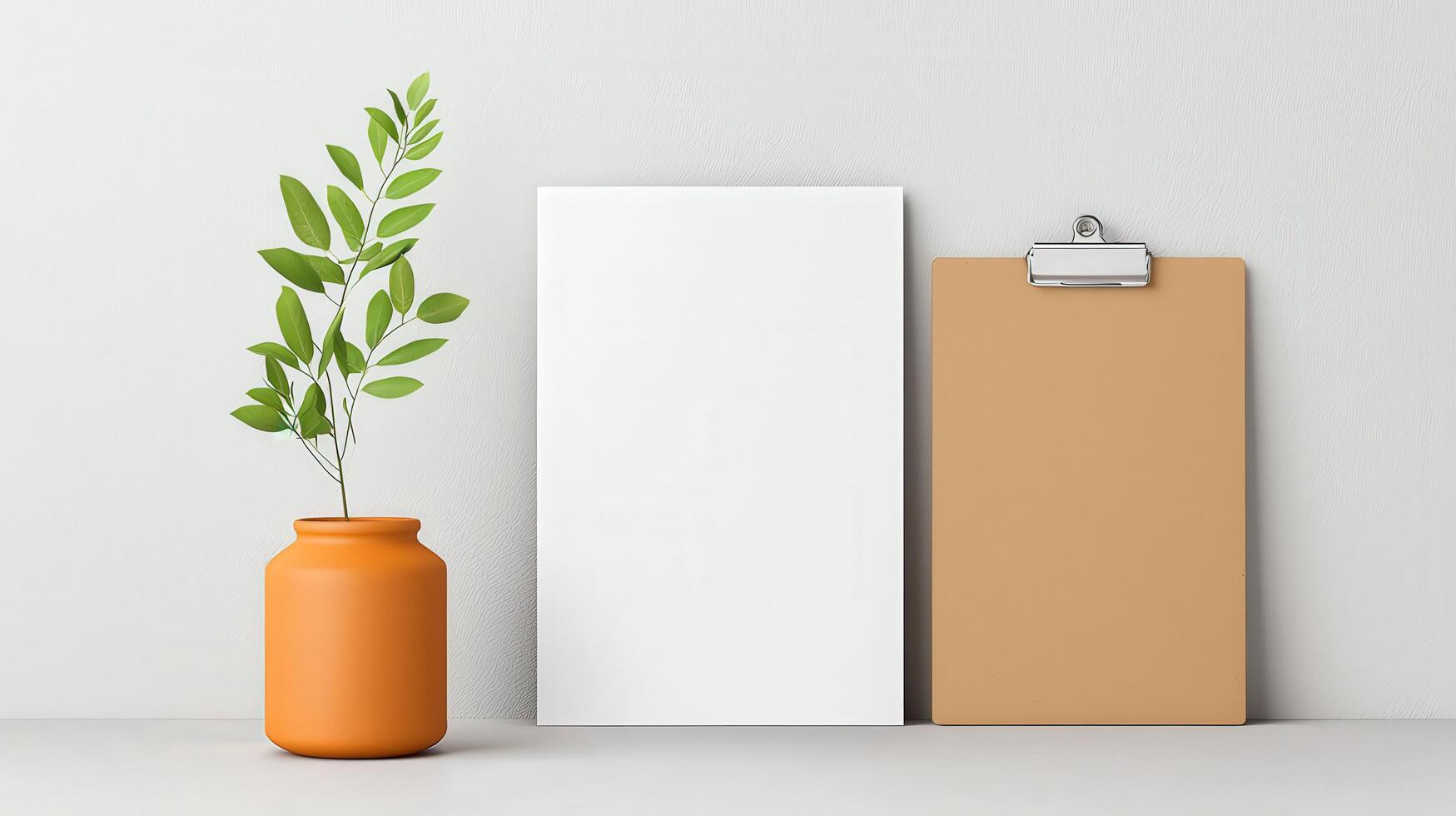 A white piece of paper sits on a table next to a vase with a plant in it photo