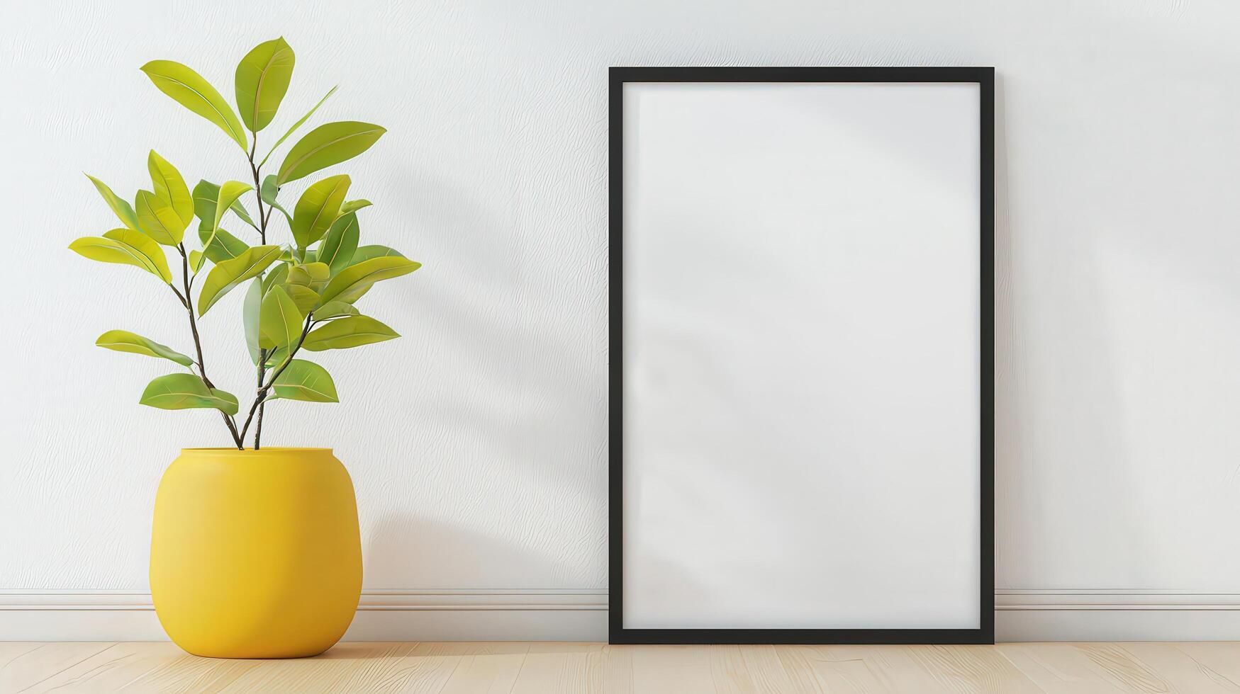 A yellow vase with a plant in it sits on a wooden table next to a black frame photo