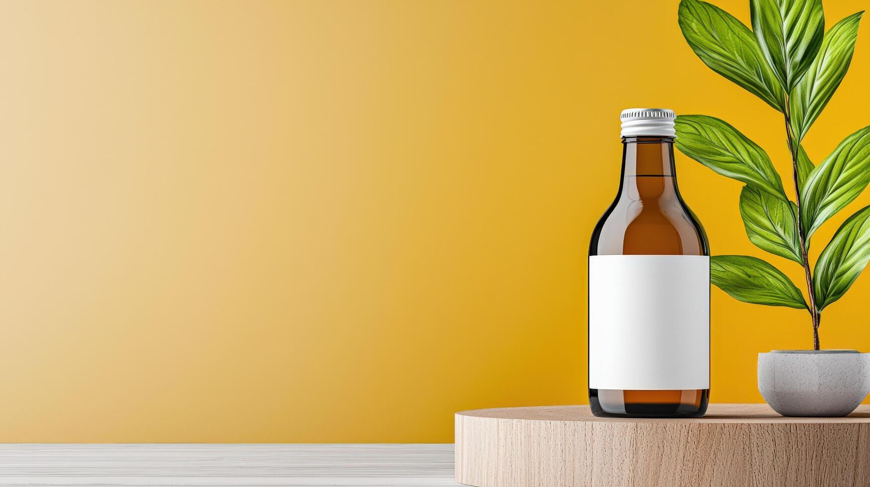 A bottle of liquid is on a table next to a plant photo