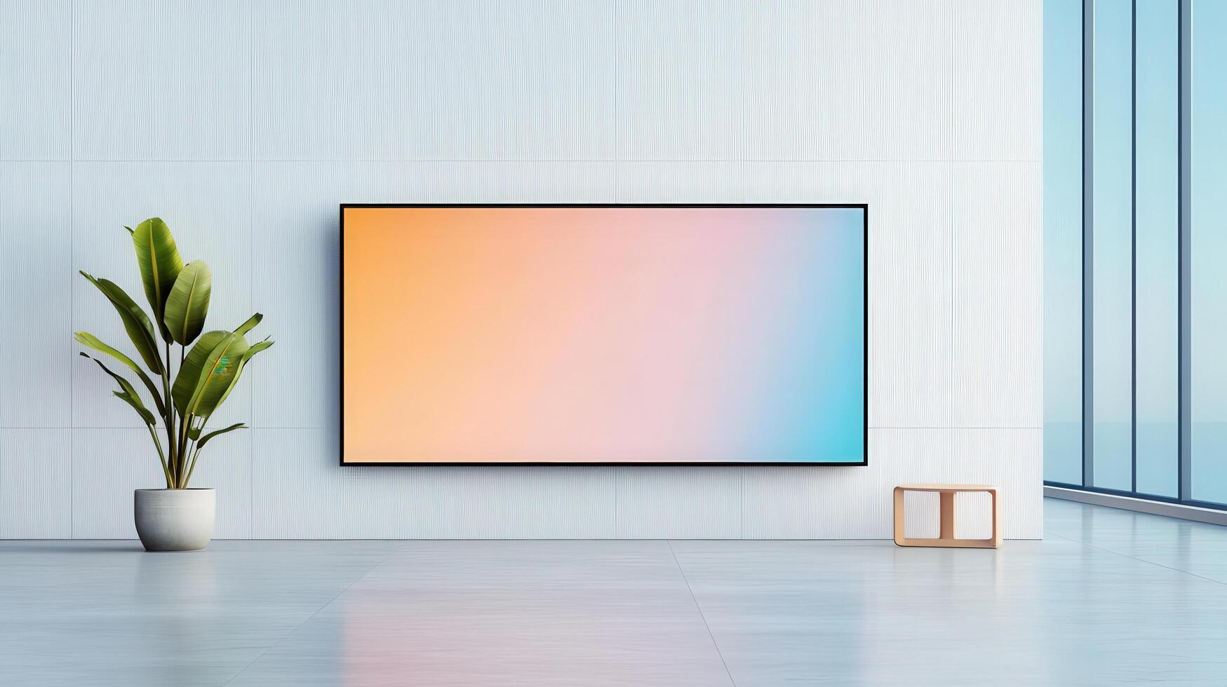 A large television screen is mounted on a wall in a room with a white wall photo