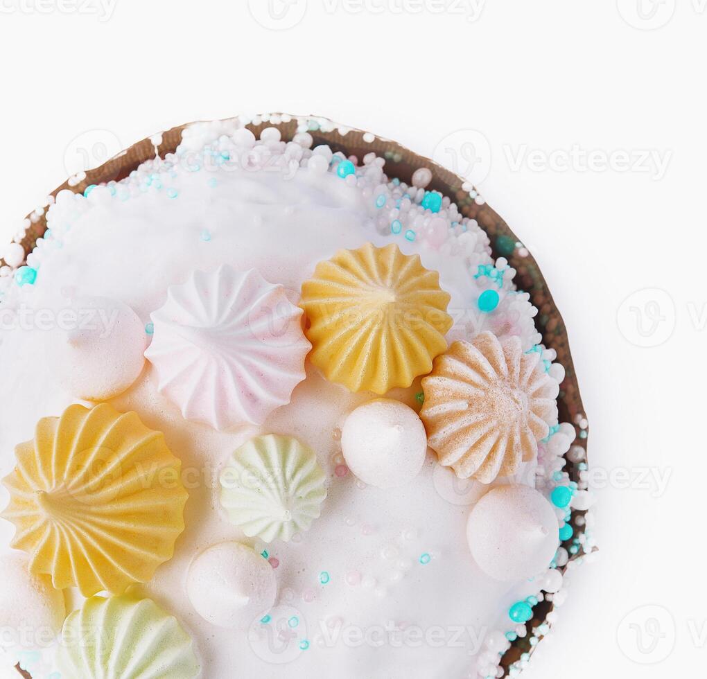 Elegant easter cake with colorful meringue and sprinkles photo
