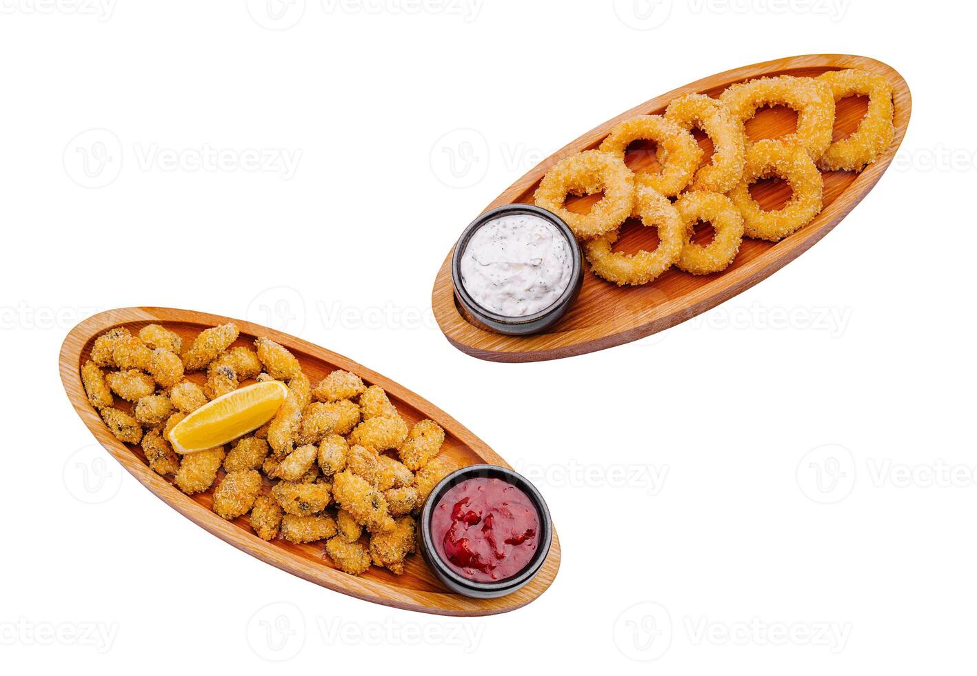 Deliciously prepared fried appetizers served on wooden platters photo