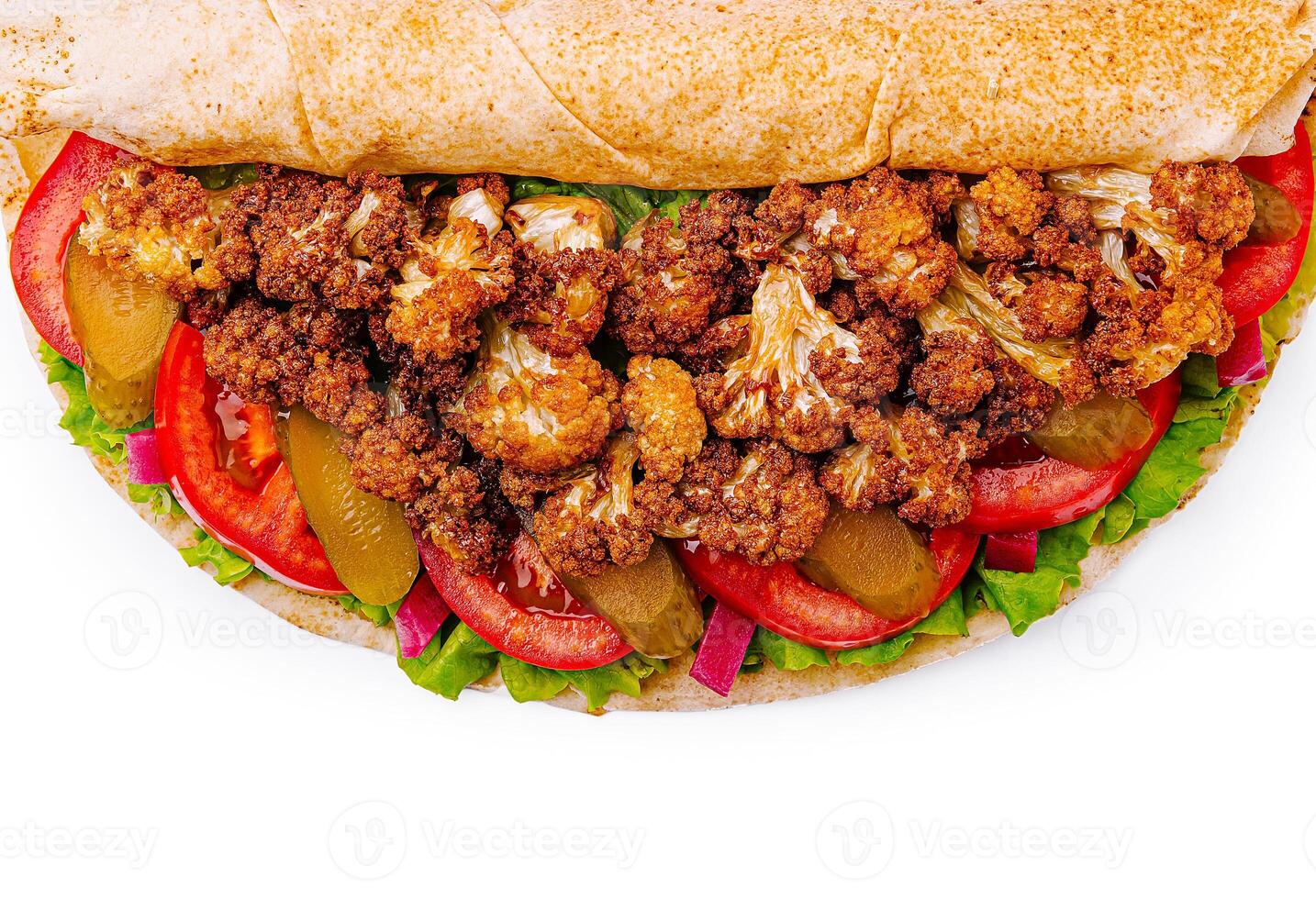 Delicious roasted cauliflower loaded sandwich with fresh vegetables photo