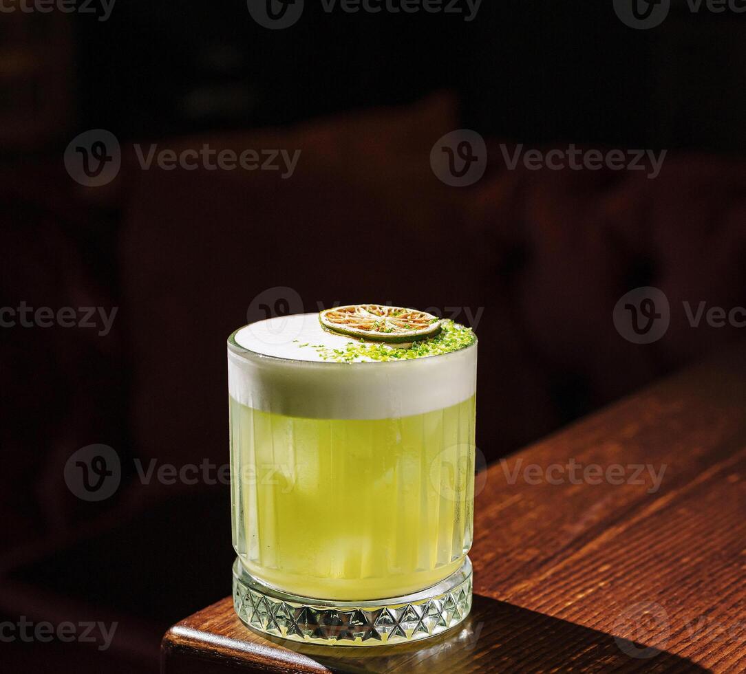 Refreshing citrus cocktail served in a stylish glass photo