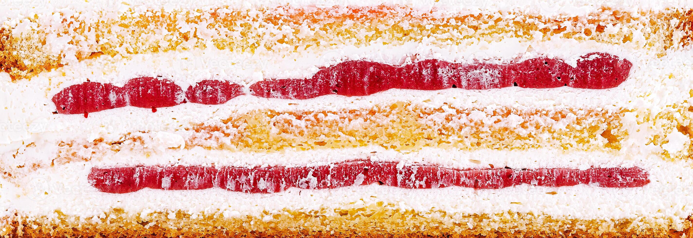 Delicious layered cake with cream and strawberry filling photo