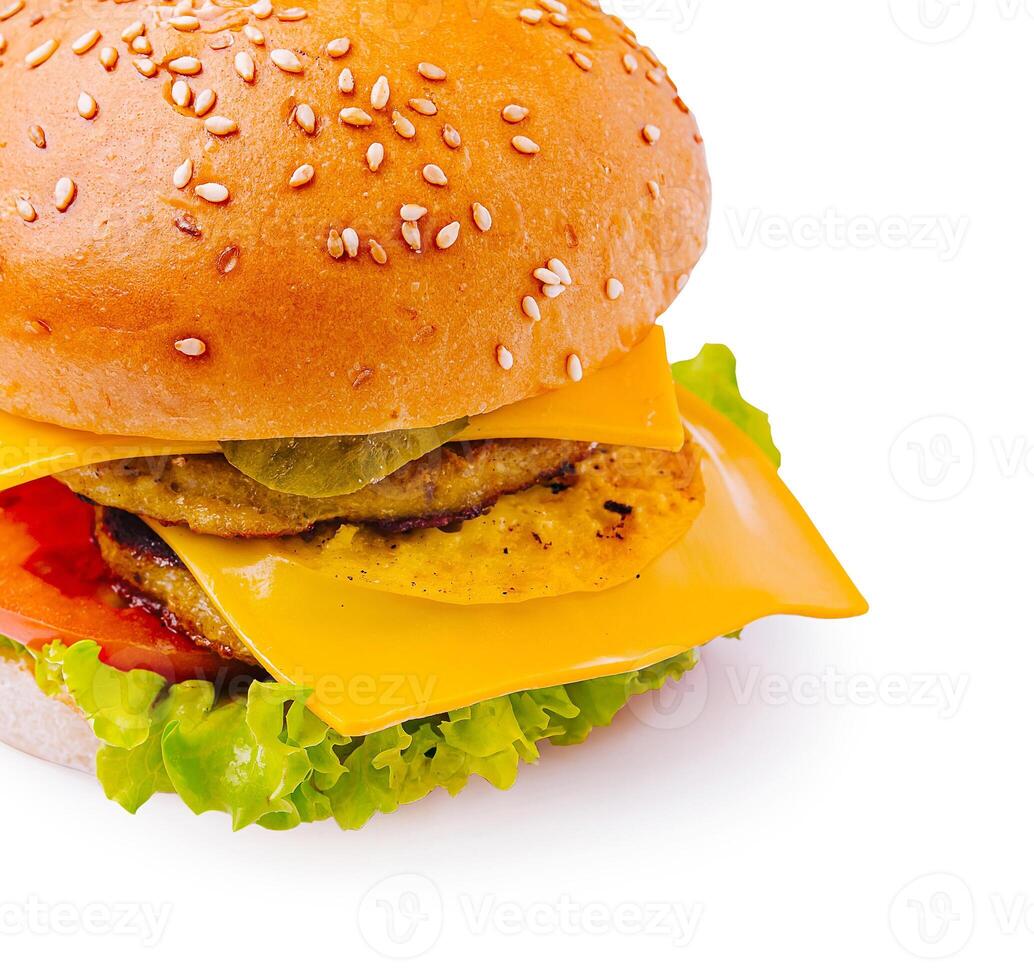 Delicious cheeseburger with fresh ingredients on a white background photo