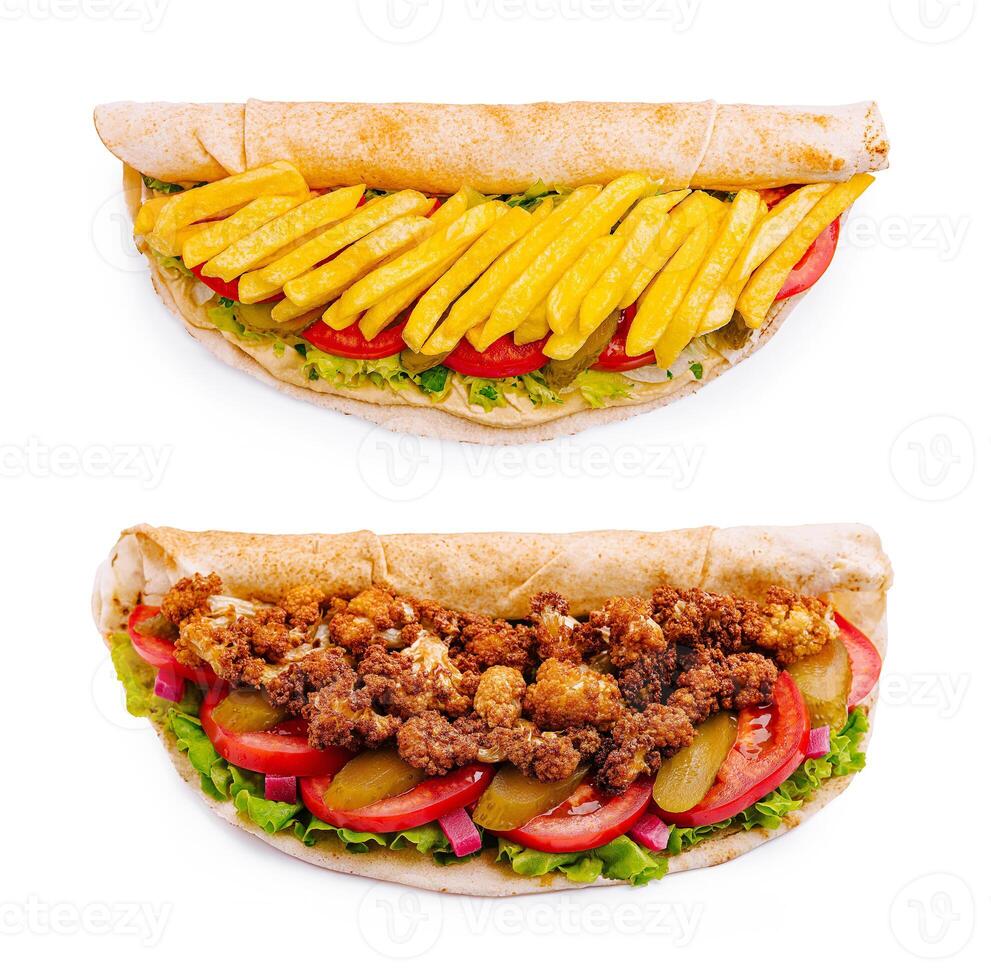 Delicious sandwiches with fried chicken and fries in refreshing wraps photo