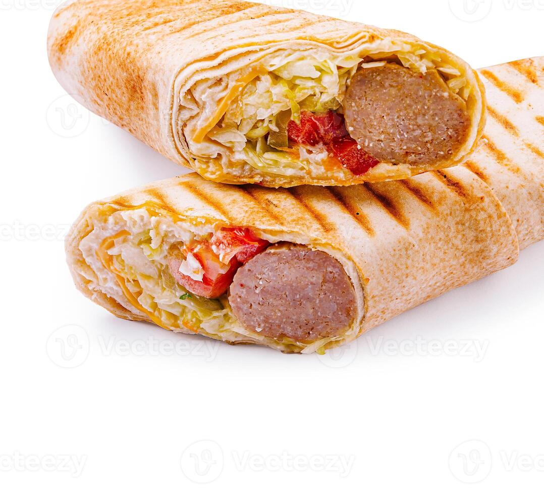 Delicious grilled wraps filled with fresh ingredients and sausage photo