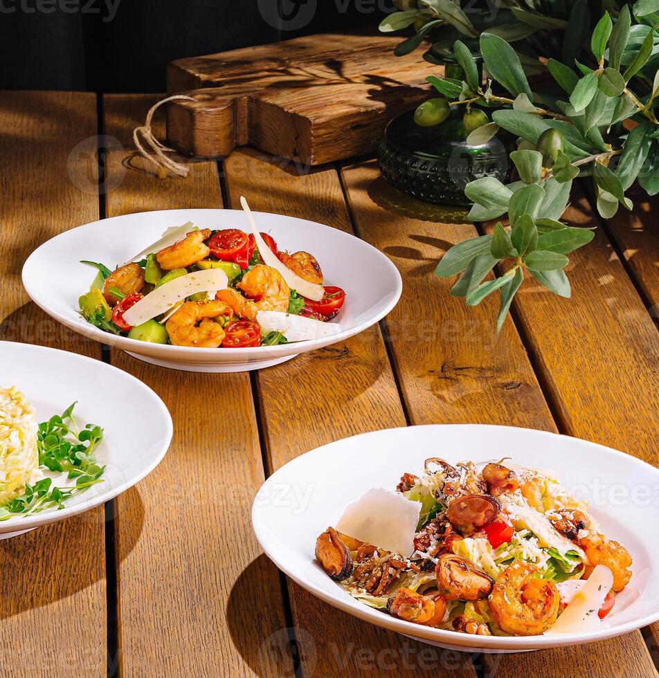 Gourmet dishes on rustic wooden table closeup photo